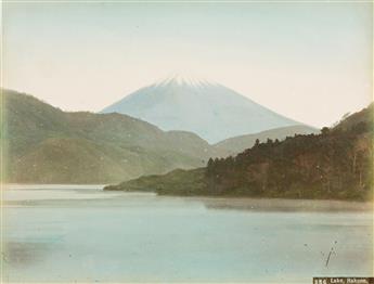 (JAPAN) A lovely Japanese album with 50 hand-colored photographs depicting geishas, lush landscapes, busy streets, and flowering garden